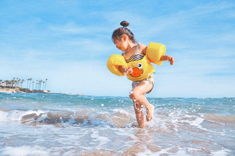 kid, swimming, full length, sunshine, summer, seashore, sand, child, leisure activity, laughing, outdoors, lifestyles, day, floaties, nature, one person