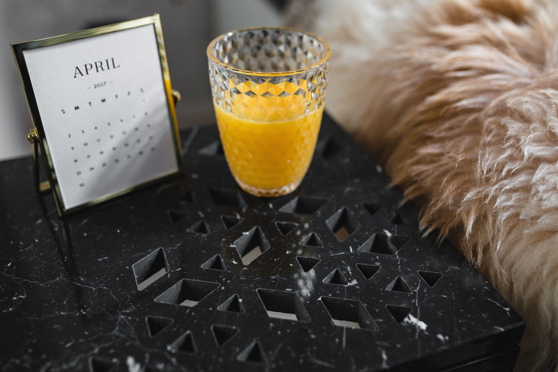 communication, high angle view, minimalism, indoors, refreshment, modern, white, orange color, drinking glass, marble, table, freshness, bedside, food and drink