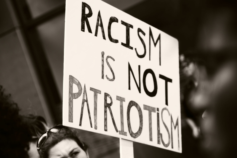 portrait, love, society, racism, protestor, message, text, outdoors, hate, headshot, sign, protest, focus on foreground, patriotism, communication, information sign