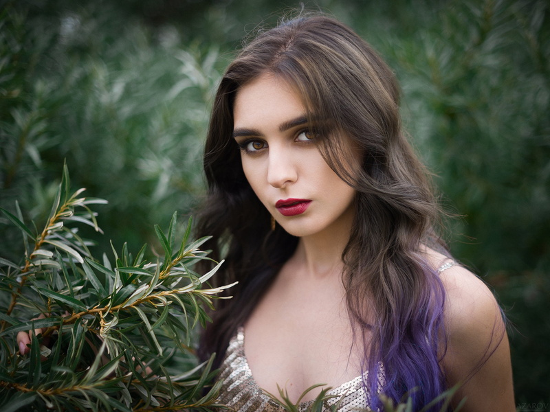 one person, brown hair, front view, contemplation, hair, red lipstick, headshot, make-up, young women, depth of field, young adult, beautiful woman, outdoors