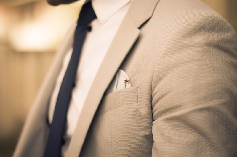 coathanger, pocket square, bokeh, wedding, business, formalwear, menswear, man, beige, people, suit, selective focus, indoors, clothing, close-up, jacket