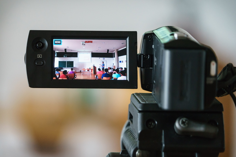 photographic equipment, lecture, camera - photographic equipment, photographer, screen, occupation, seminar, teaching, recording, communication, connection