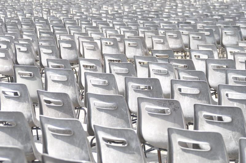 repetition, side by side, meeting, human, arrangement, stadium, pattern, steel, presentation, rows of seats, absence, space, lecture, large group of objects