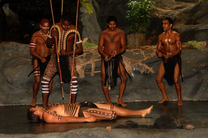 floor, standing, outdoors, 2K, lying, adult, clothing, holding, full length, stick, water, men, four, lifestyles, women, s, aborigines, day, beside, native american