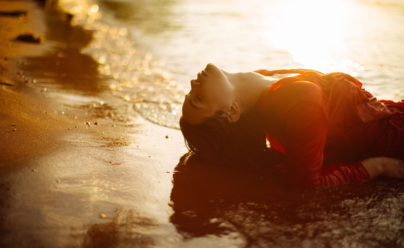 model, holiday, land, wet hair, women outdoors, outdoors, one person, closed eyes, water, relaxation, wet clothing, vacations, sunlight, sea, women, eyes closed