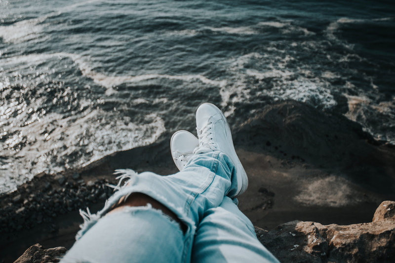 white, body part, summer, real people, shoes, vacations, feet, sneakers, solid, leisure activity, males, 4K, resting, casual clothing, pair, rock - object