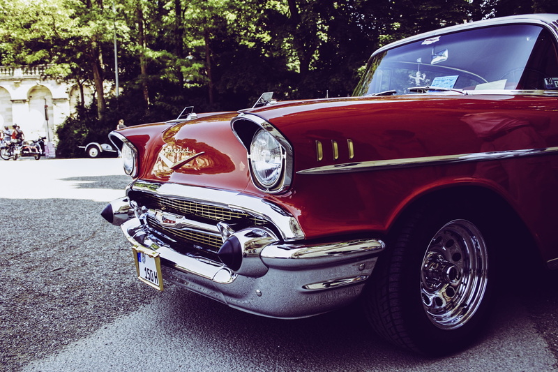 transportation, motor vehicle, city, land vehicle, car, muscle car, gloss, tree, red, auto, street, us car, vintage car, bumper, stationary, chrome, parking
