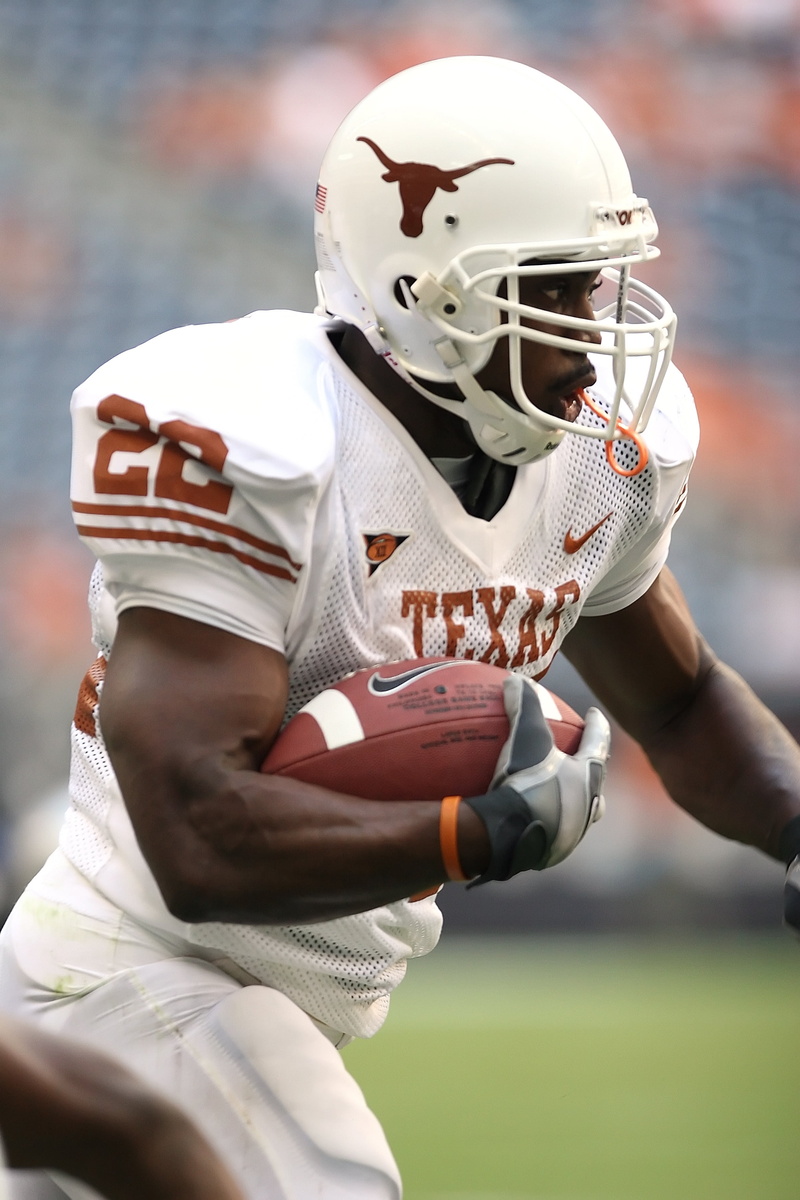 american Culture, sports Uniform, orange, football american, ball, college, running back, team Sport, focus on foreground, football, action, helmet, sport