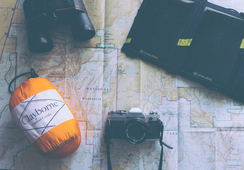 canon, technology, beside, high angle view, camera - photographic equipment, adventure, outdoor, travel, group of objects, day, connection, still life