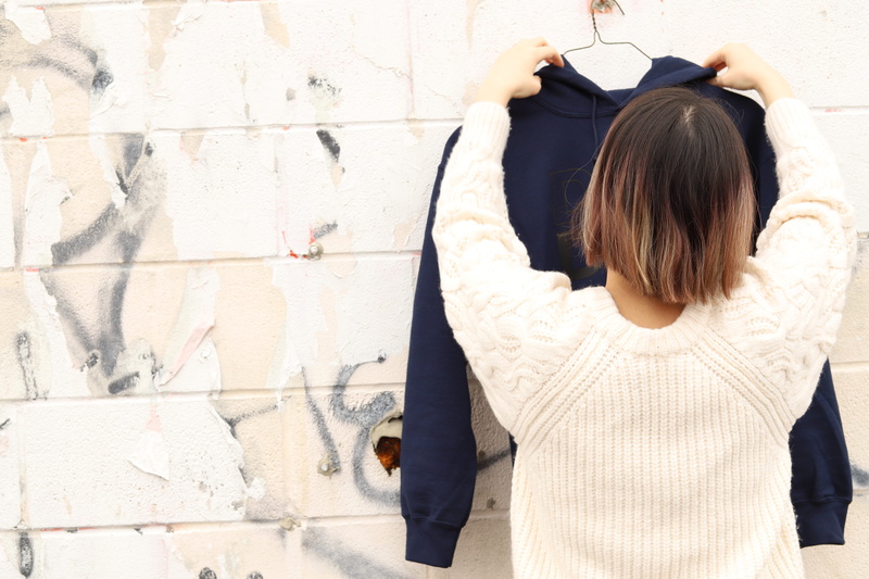 hood, pants, wall - building feature, casual clothing, human, female, young adult, person, 5K, photo, sweatshirt, hairstyle, day, sleeve, one person, white