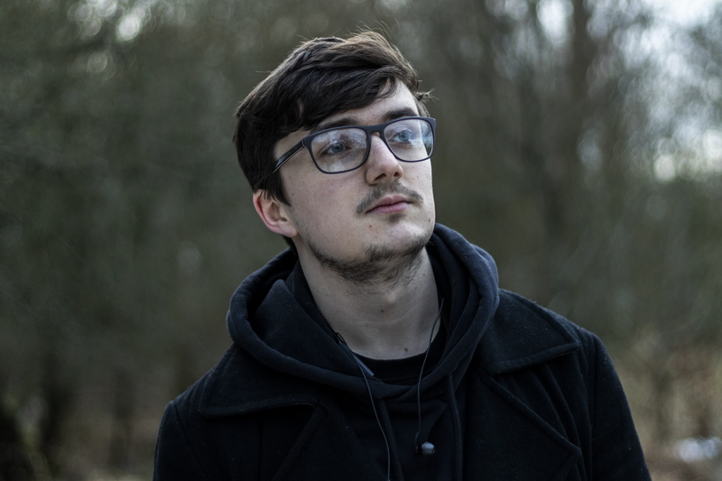 front view, winter, beard, black, photo, young men, person, sweater, accessories, glasses, tree, hood - clothing, young adult, looking away, hampshire