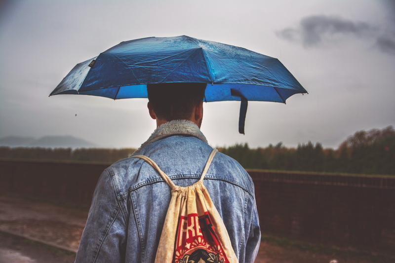 one person, rear view, outdoors, men, security, drawstring, landscape, standing, 5K, environment, protection, cloud - sky, sky, nature, real people, rain