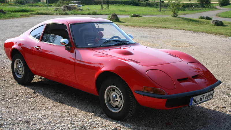 old, motor vehicle, city, 69, opel gt, focus on foreground, land vehicle, cool car, toy, transportation, cars, road trip, 1969, luxury, travel, mode of transportation