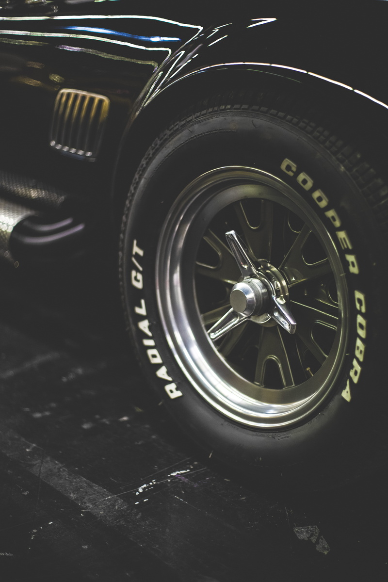 vehicle, cooper, outdoors, alloy, high angle view, dark, auto racing, fender, automotive, shiny, style, metal, design, car, rim, land vehicle, stylish
