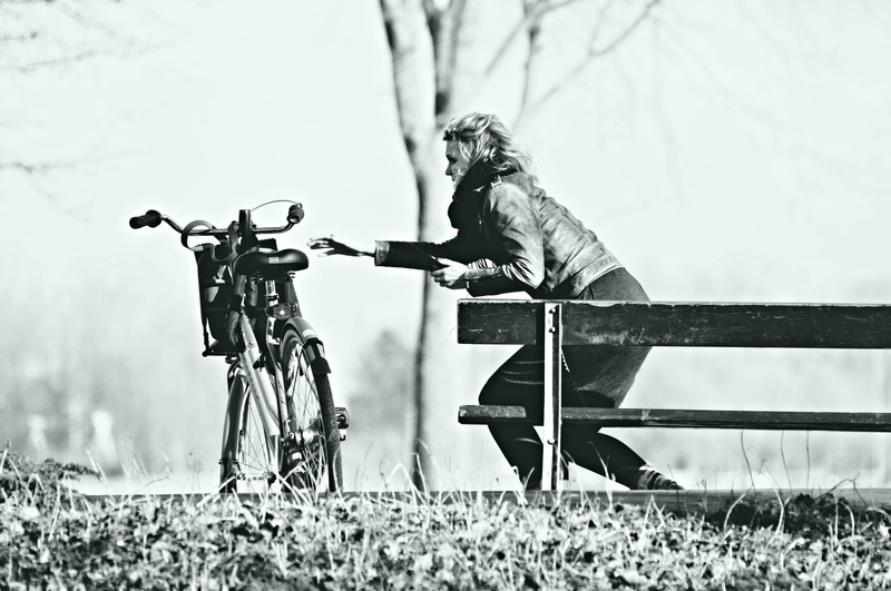 women, leisure activity, focus on foreground, hand, field, standing up, land, outdoors, real people, casual clothing, sitting, stretched out, prevent, bicycle