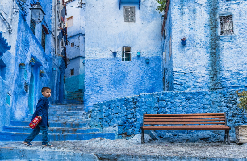 building exterior, males, bench, building, side view, real people, men, boys, architecture, childhood, built structure, day, outdoors, wall - building feature