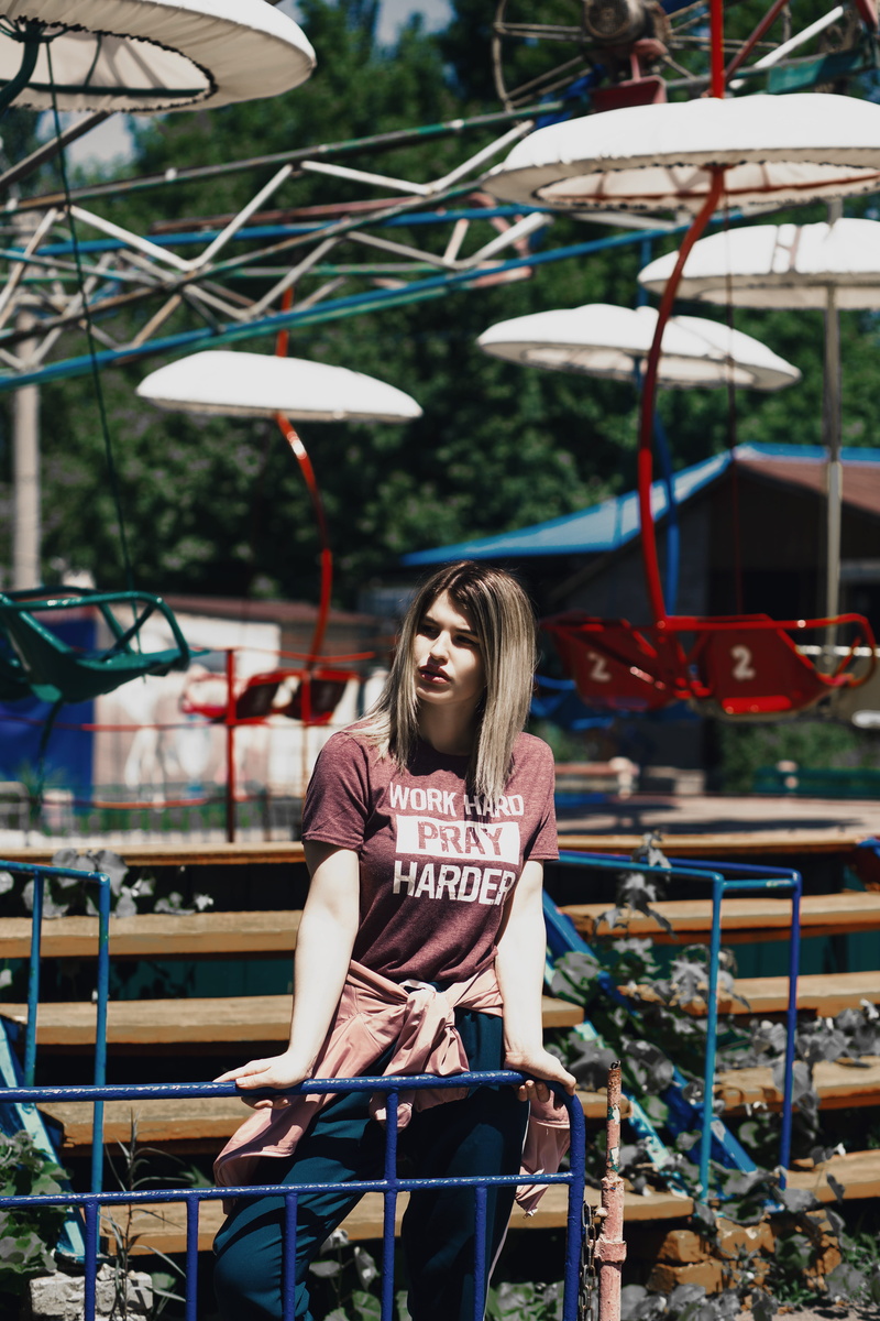 travel, brown, festival, outdoors, young adult, sitting, carnival, outfit, girl, happiness, young women, long hair, hairstyle, woman, adult, metal, rides