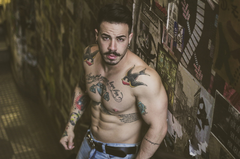 wall, art and craft, lifestyles, beside, man, tattoo, brawny, portrait, one person, leisure activity, creativity, tattoos, muscles, indoors, three quarter length