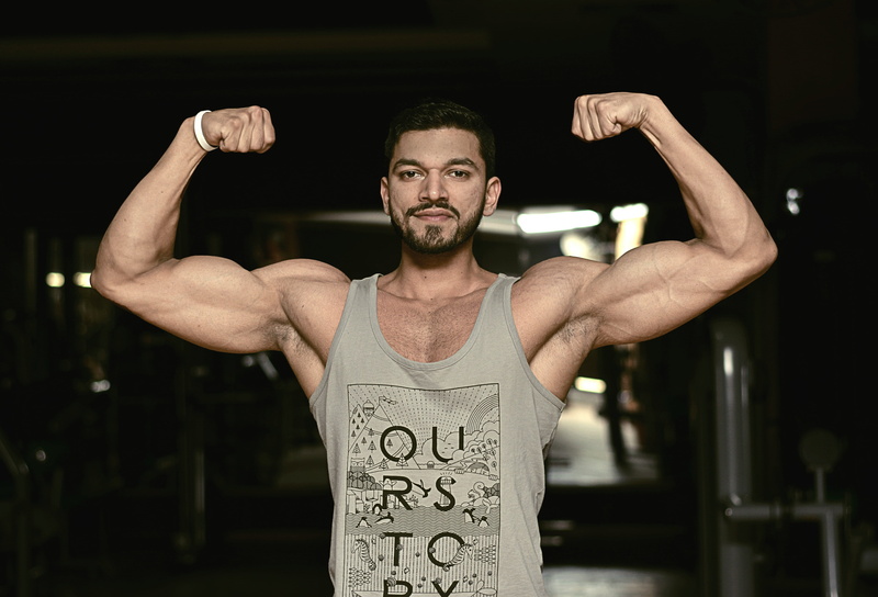 one person, person, standing, fit, weight training, portrait, strength, fine-looking, pose, human limb, front view, arms raised, muscles, exercising, men