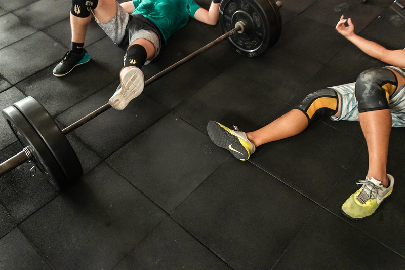 healthy lifestyle, black, low section, fashion, heavy, bodybuilding, women, people, wear, vitality, two people, indoors, shoe, bodybuilder, floor, barbell