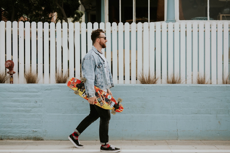 denim, longboard, white, adult, warm clothing, board, button, full length, guy, multicolored, real people, outdoors, punk, holding, long, footpath, man