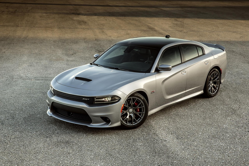 racecar, indoors, dodge, silver colored, mode of transportation, car, wealth, sports car, no people, retro styled, luxury, charger, wheel, vintage car