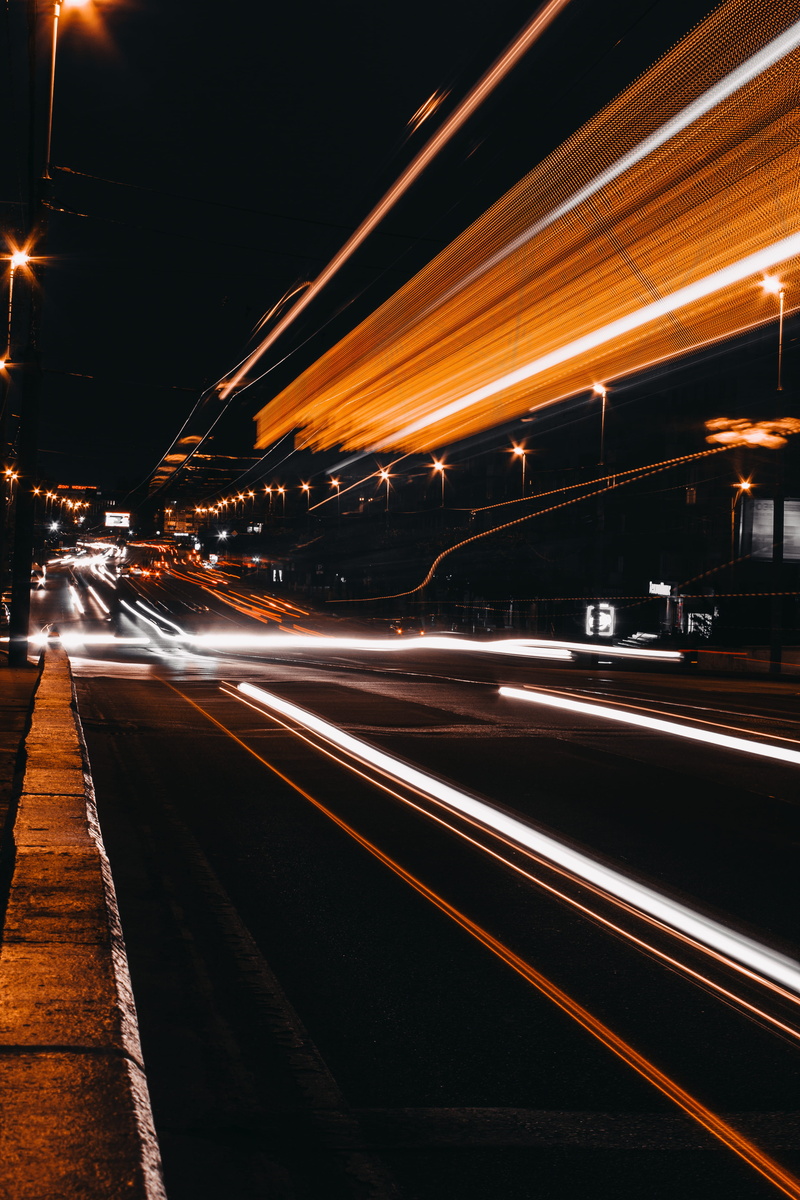 outdoors, transportation system, landscape, motion blur, vehicles, built structure, expressway, blurred motion, light streaks, street lamps, color, lanes