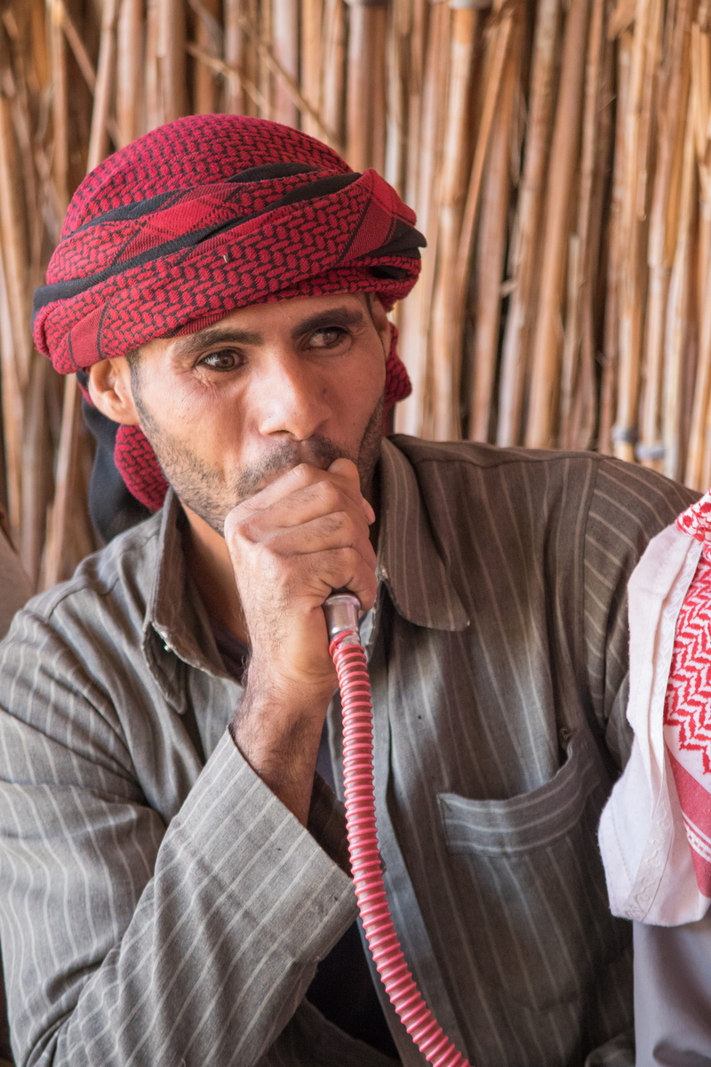 contemplation, hold, headscarf, close-up, shisha, 5K, knit hat, headshot, front view, looking at camera, one person, male, style, clothing, occupation