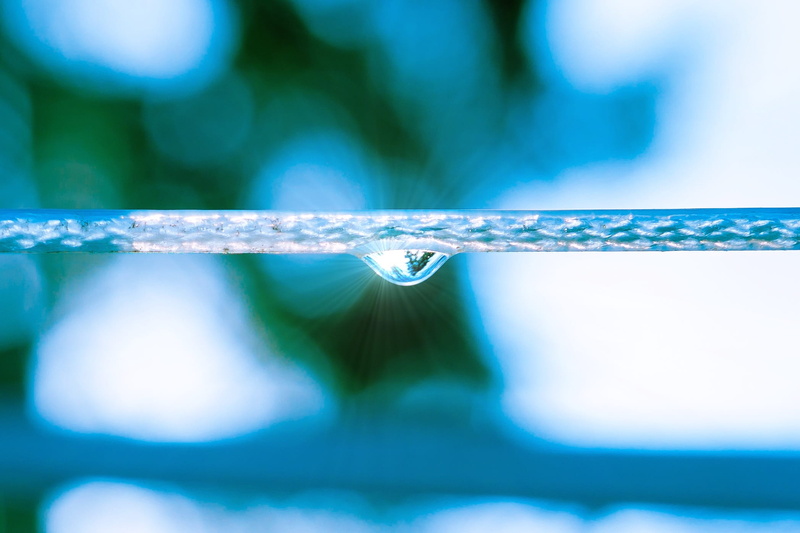 no people, full frame, reflection, surface tension, vibrant color, water, refraction, abstract, lonely, ice, raindrop, backgrounds, abstract backgrounds
