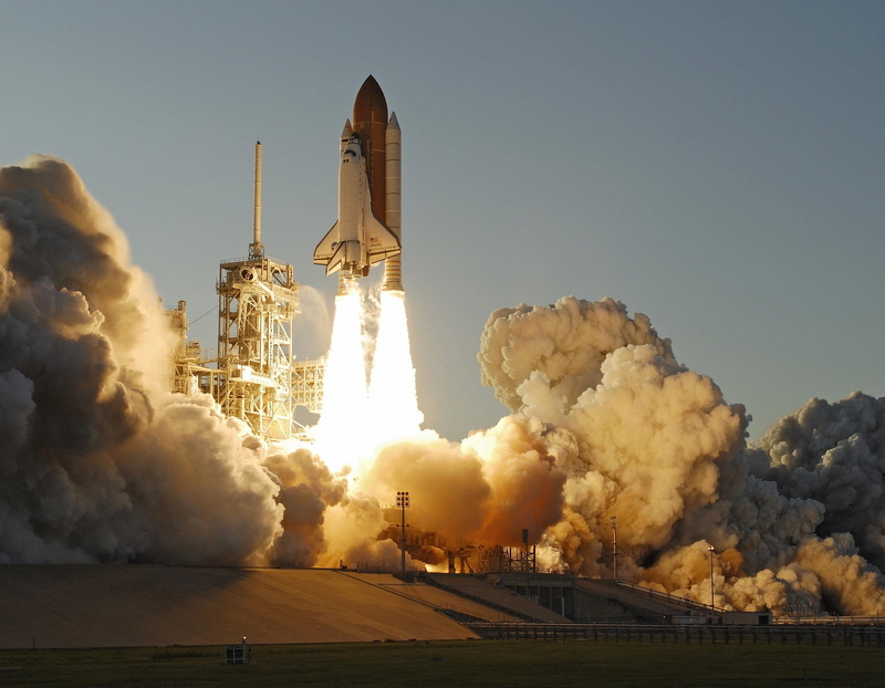 sky, space travel vehicle, pollution, air pollution, mode of transportation, spacecraft, clear sky, smoke - physical structure, built structure, atlantis space shuttle