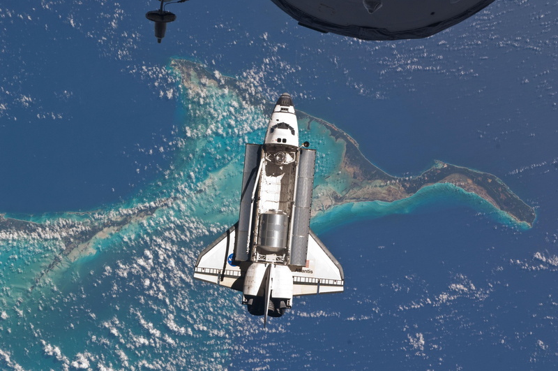 mode of transportation, space, plane, transportation, aerospace industry, military training, shuttle, nasa, single object, navy, air vehicle, sea, on the move