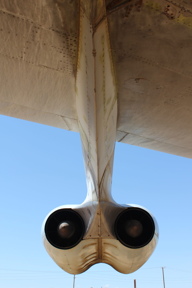 engine, no people, directly below, close-up, warfare, low angle view, transportation, air Vehicle, clear sky, aircraft, blue, sunlight, Aviation, travel
