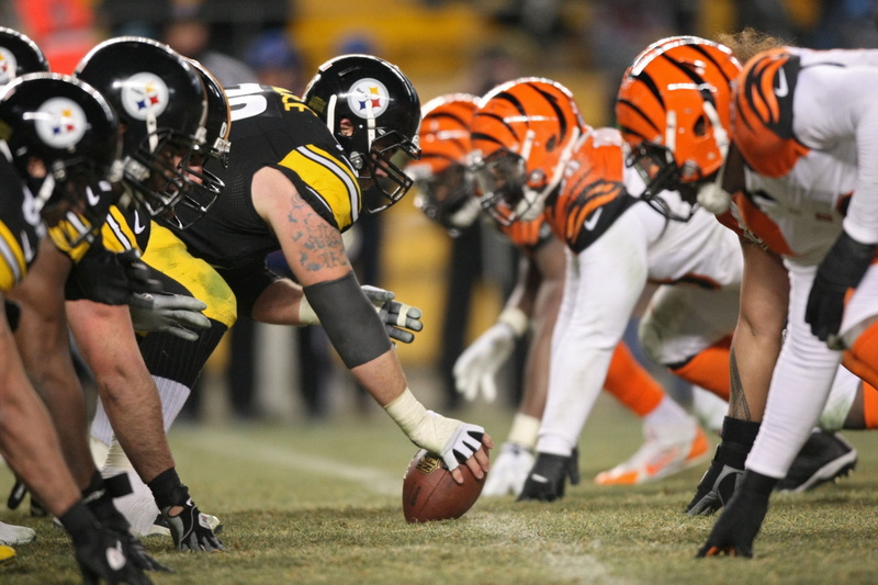 american football - ball, american football field, sportsman, headwear, challenge, sports equipment, competition, offense - sporting position, conquering adversity