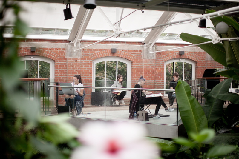 floor, patio, clothing, geranium, nature, porch, plant, restaurant, women, real people, cafeteria, laptop, people, door, human, rear view, selective focus
