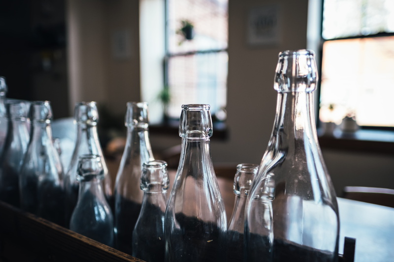 wine, cafe, glass - material, drink, photography, food and drink, window, clear, restaurant, household equipment, bottles, focus on foreground, table, refreshment