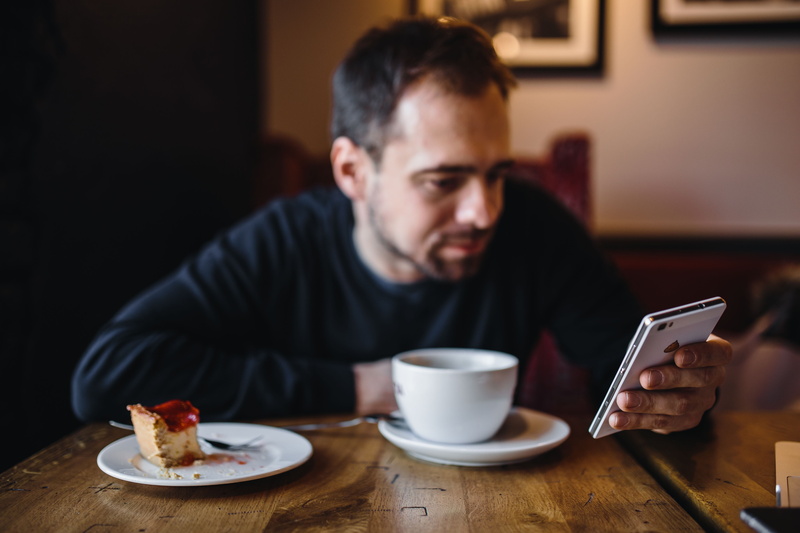indoors, focus on foreground, internet, mug, crockery, Young, lifestyles, casual Clothing, drinking, adult, wireless Technology, interior, sititng, one Person