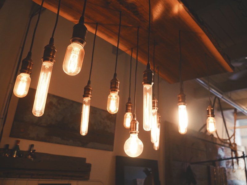 in a row, light bulb, light bulbs, pendant, pendant light, filament, illuminated, hanging, ceiling, indoors, night, lighting equipment, turned, glass - material