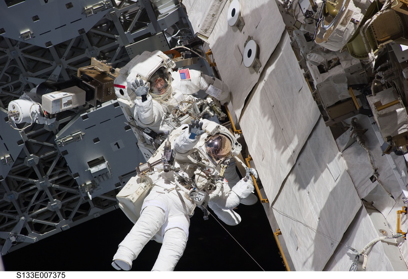 adult, equipment, indoors, business, extravehicular activity, factory, metal, futuristic, spacewalk, space exploration, tools, two astronauts, technology