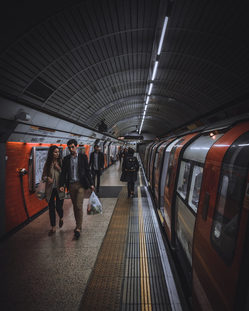 couple, street photography, baker street, mode of transportation, travel, real people, city, walk, platform, urban, railroad station, railroad station platform