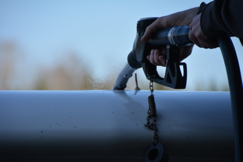 gas pump, land vehicle, fuel, lifestyles, men, refuel, petrol, transportation, human body part, day, human finger, real people, body part, nature, human hand