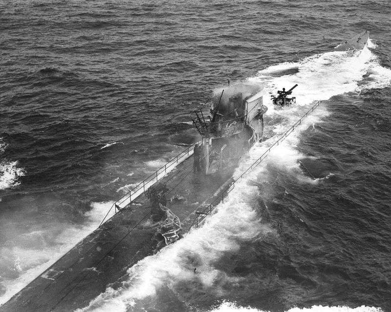 day, outdoors, submarine, vintage, real people, black, high angle view, surfing, wave, aquatic sport, motion, nature, beauty in nature, people, power in nature