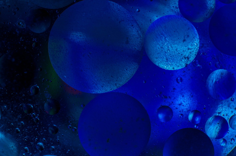 full frame, abstract backgrounds, close-up, biology, blue, no people, 4K, wet, Colors, liquid, backgrounds, floating on water, indoors, shape, Wheels