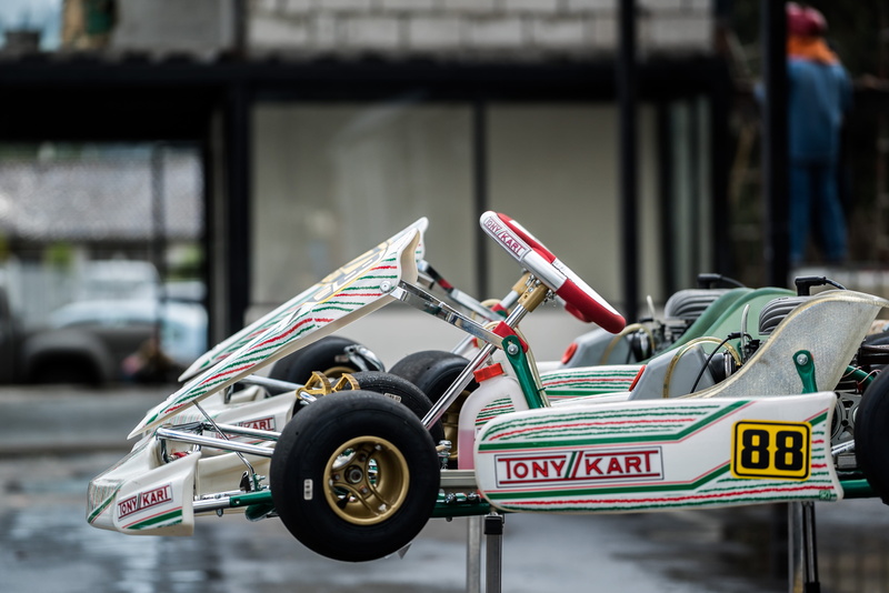 outdoors, car, kart, 4K, motor vehicle, white, bicycle, racing, karting, city, street, sign, travel, road, text, motorcycle, communication, red, wheel