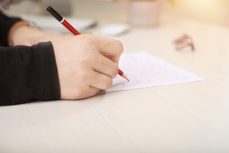 selective focus, human body part, human hand, writing, office, wooden, sheet, child, real people, fill, omr, table, 5K, portrait, pen, filled, note pad