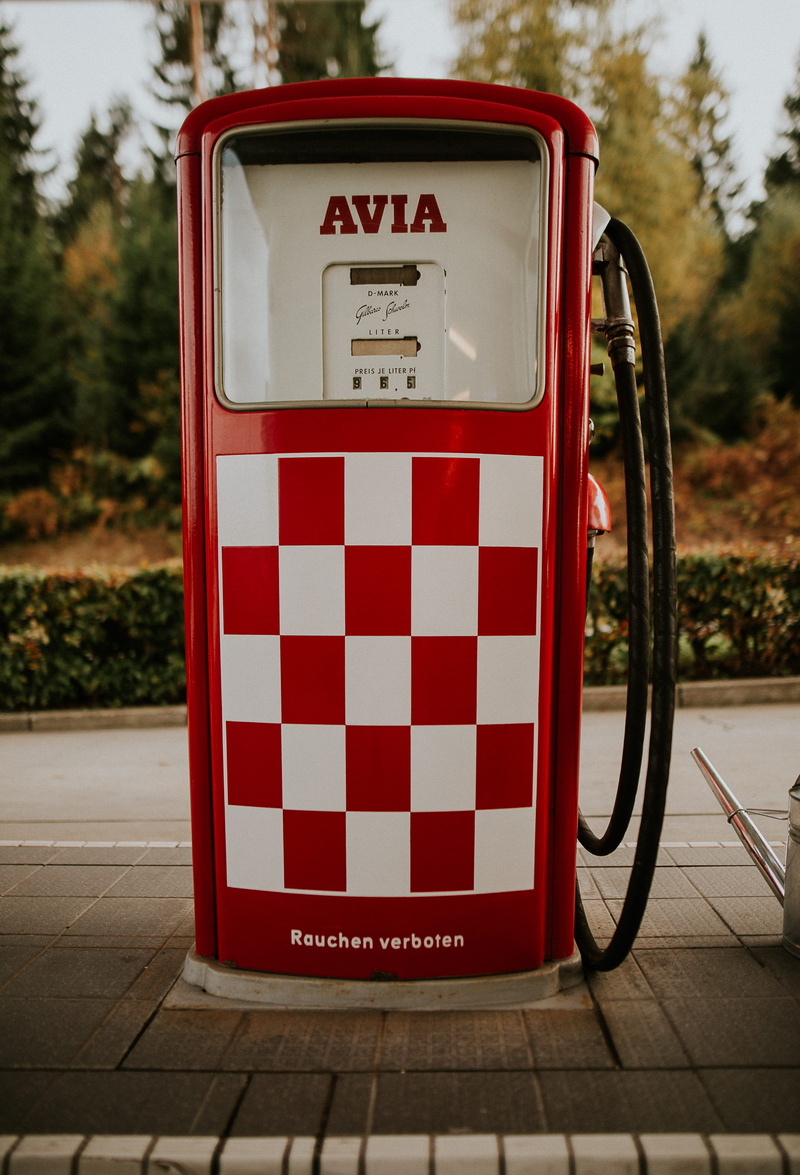 communication, petrol pump, sign, fuel and power generation, gas pump, western script, striped, gasoline, text, photo, technology, fossil fuel, white, station