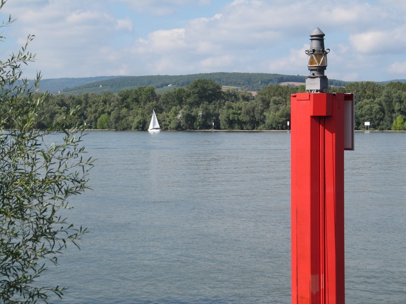 lake, Filling Station, water filling station, red, cloud - sky, tree, transportation, guidance, signal, waterfront, outdoors, sea, nautical vessel, architecture