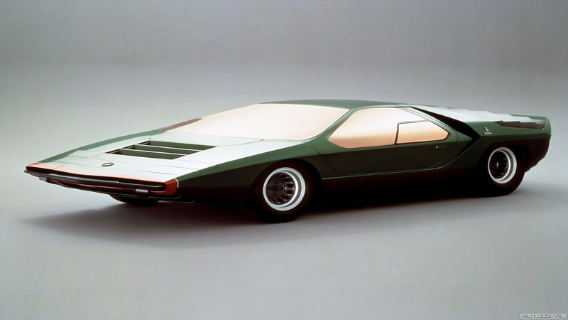 indoors, technology, gray, alfa romeo carabo, motor vehicle, transportation, gray background, choice, sports car, colored background, shiny, silver colored