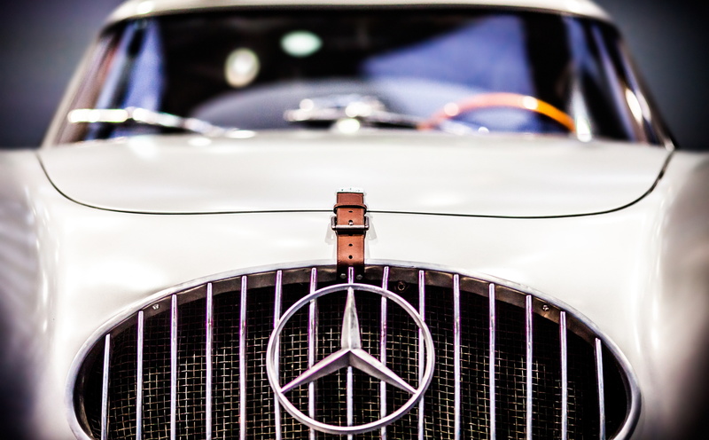 outdoors, focus on foreground, mode of transportation, automobile, transportation, Michigan, land vehicle, front view, day, silver, united states, 5K