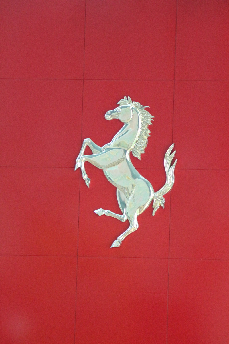 business, animal themes, creativity, tiled floor, flooring, icon, animal representation, symbol, close-up, logo, mammal, art and craft, architecture, automotive