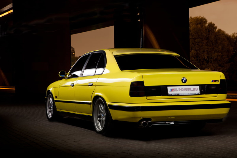 scene, sedan, e, yellow taxi, Cars, yellow, no people, transportation, m, stationary, motor vehicle, number, BMW, car, 480P, sports car, city, outdoors